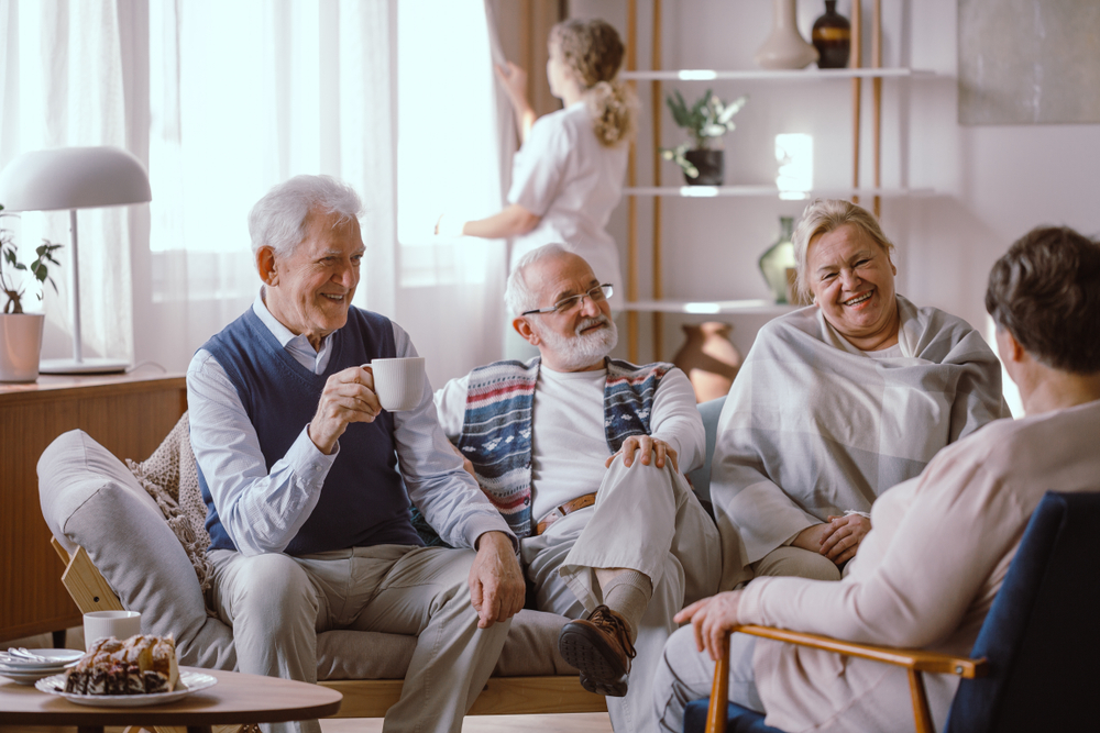 Group of seniors enjoying coffee together